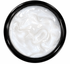 Top view of luxurious glossy white skincare gel with a smooth, hydrating texture inside an open, shiny black cosmetic jar. Premium skincare product by I’M FABULOUS COSMETICS.